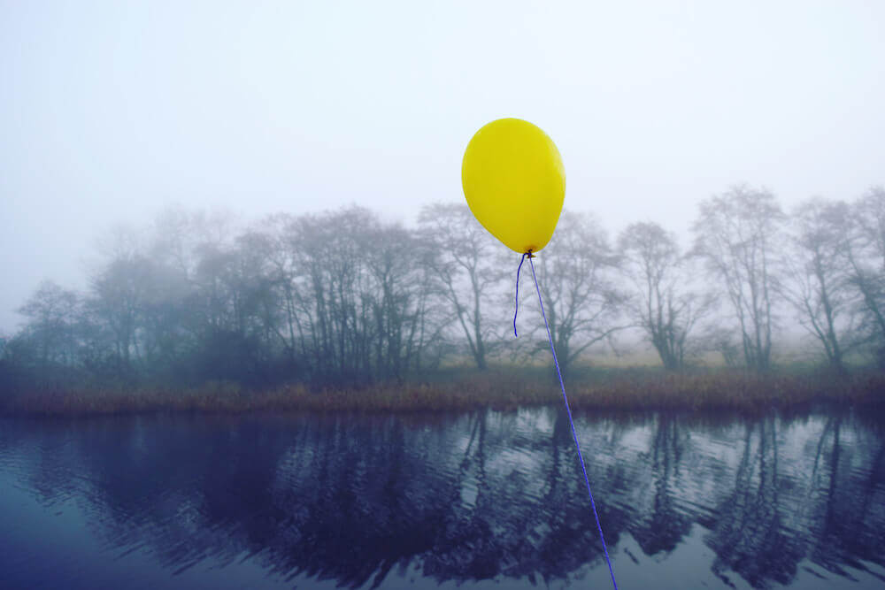 balloon in a grey sky for tips for creative blocks